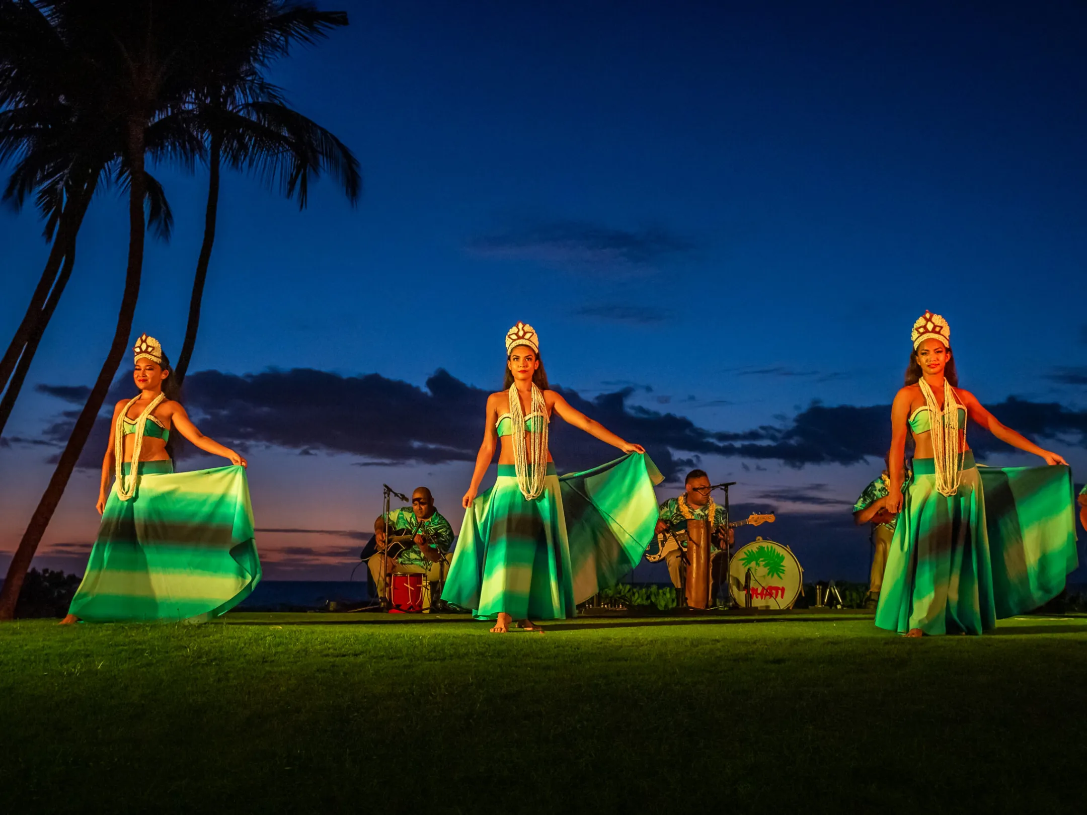 Hawaiian hula dancers on stage at Andaz Maui lūʻau