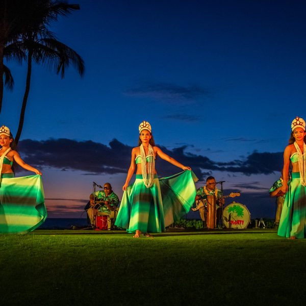 Hawaiian hula dancers on stage at Andaz Maui lūʻau