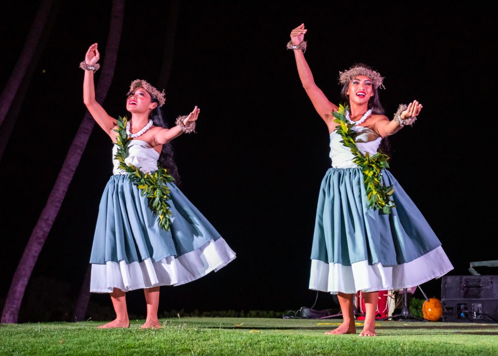 Hula dancers performing on the lawn at The Feast at Mokapu